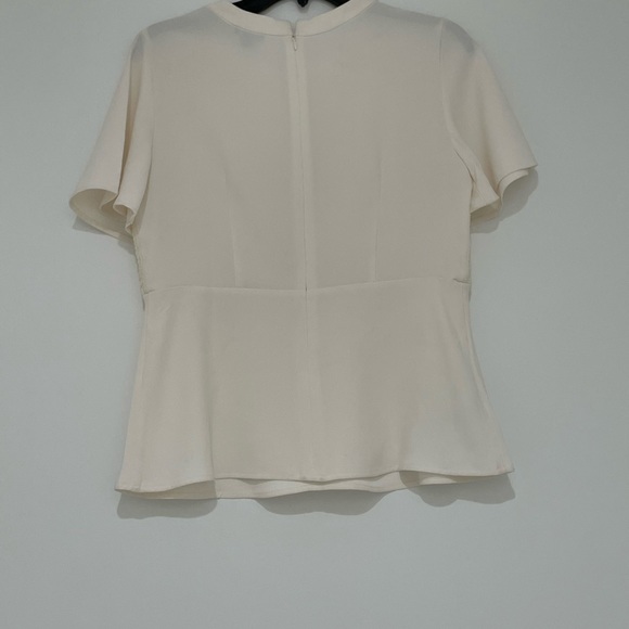 Ann Taylor| Petite |Cream with flare short sleeve. Peplum cut. Zipper back. - Picture 3 of 5